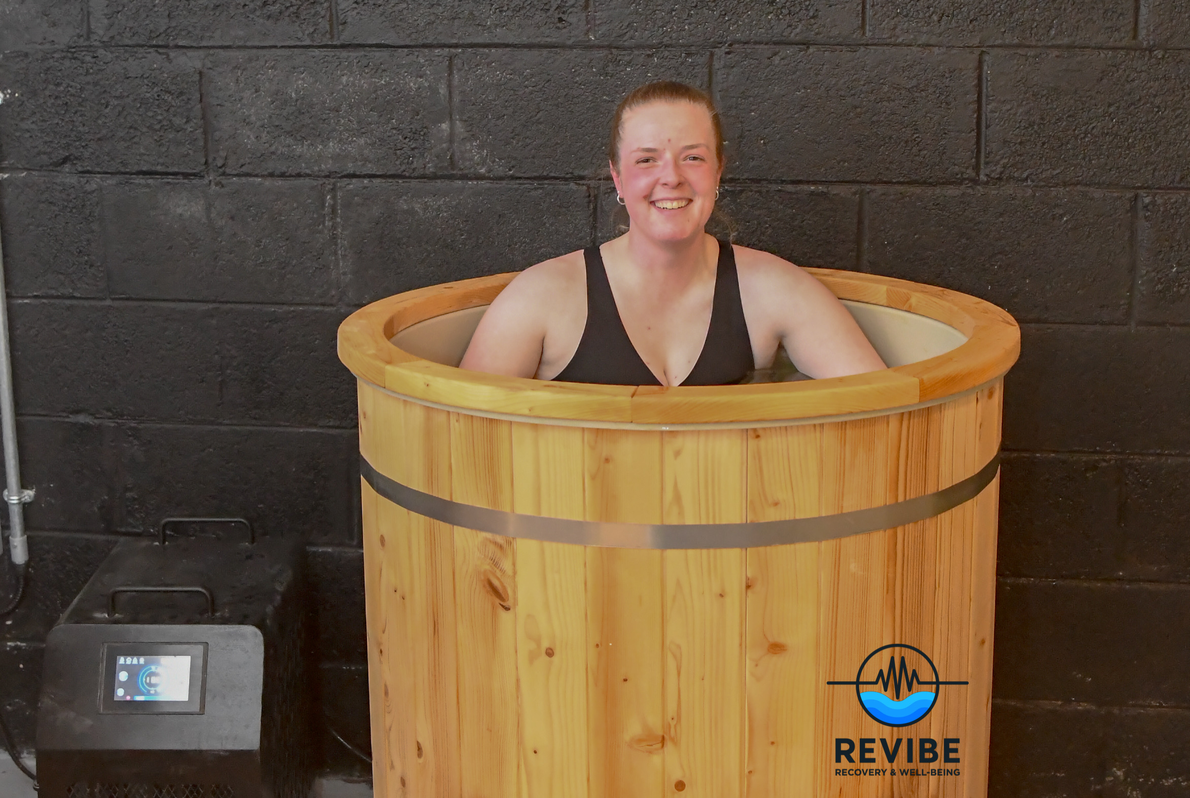 Customer enjoying a cold plunge at Revibe